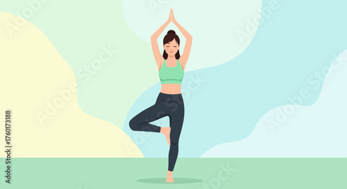 Young woman practicing yoga tree pose for balance and mindfulness.
