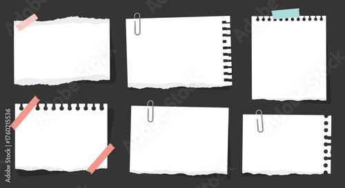 Collection of blank torn paper notes attached with tape and paperclips on a dark background.