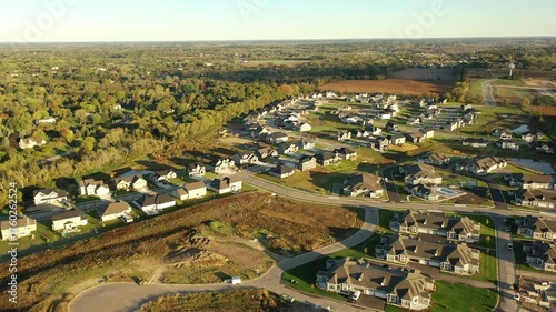 Building residential neighborhood. Aerial view of new construction houses. Establishing shot of Midwestern United States