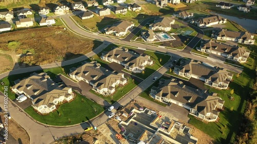 Building residential neighborhood. Aerial view of new construction houses. Establishing shot of Midwestern United States
