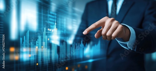 Businessman in suit interacting with futuristic digital financial graph data and bar charts hologram symbolizing investment and financial analysis