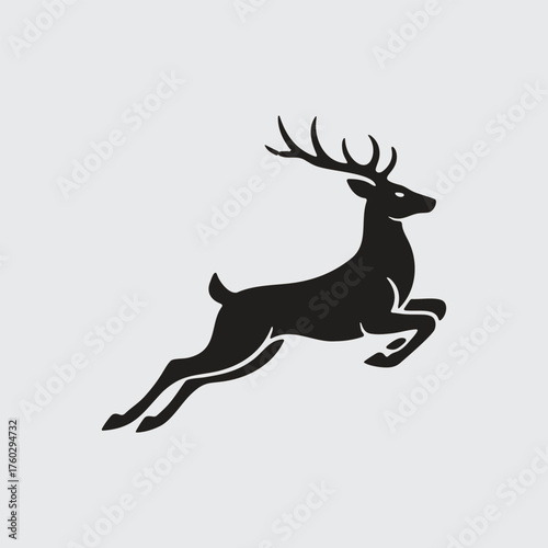 Black Silhouette of a Jumping or Leaping Deer with Antlers
