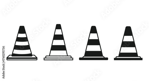 Four black and white traffic cones arranged in a simple row display