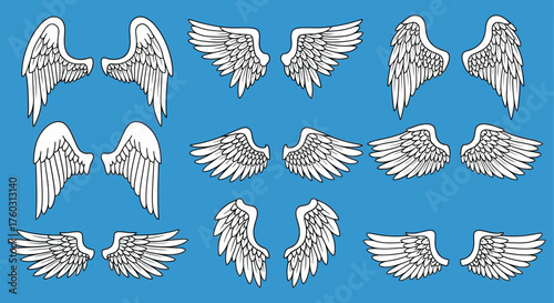 Assorted White Wings on Blue Background Angelic Design Elements