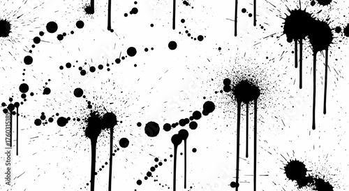 Abstract grunge design element featuring a collection of black ink splatters, paint drops, and dripping stains isolated on a white background