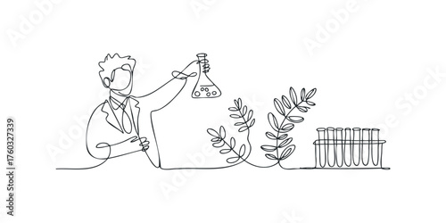 Scientist examining flask with plant and test tubes