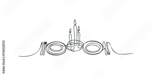 Table setting with plates, cutlery, and candles