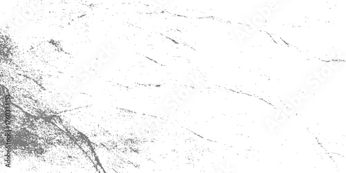 Abstract grunge texture of an old gray wall with a black ink splat pattern on a rough concrete surface