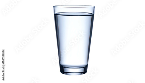 A clear glass is full of water on a stark black background