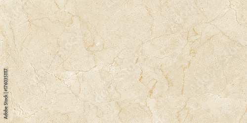 Tablou pe pânză Premium polished marble slab featuring warm cream tones and natural golden veining