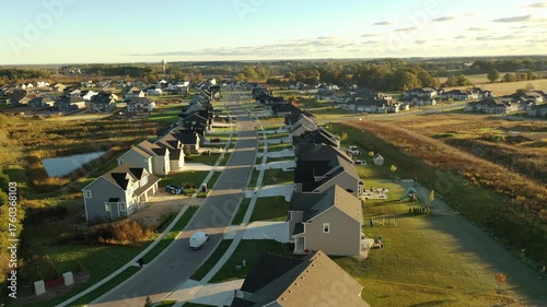 Building residential neighborhood. Aerial view of new construction houses. Establishing shot of Midwestern United States