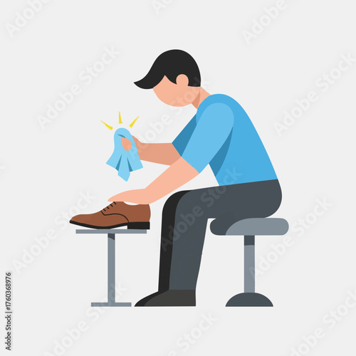 A focused individual demonstrates meticulous care by polishing a classic brown leather shoe with a blue cloth, achieving a brilliant shine for a professional look.