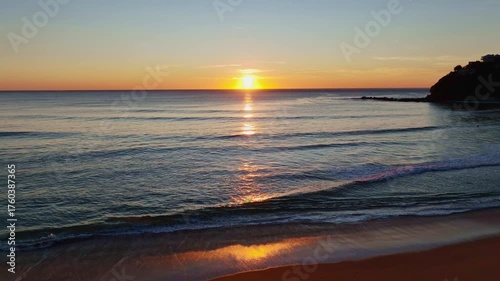 Peaceful Coastal Sunrise Under Clear Skies at Palm Beach on the Northern Beaches of Sydney, NSW, Australia.