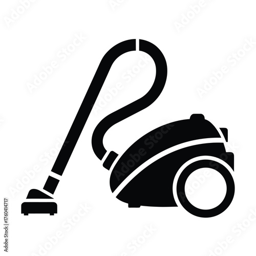 Black vacuum cleaner with hose and nozzle cleaning