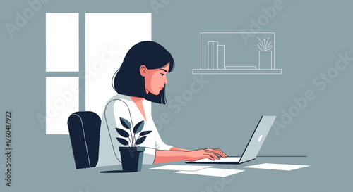 Focused woman working on a laptop at her remote office desk Freelancer business and productivity