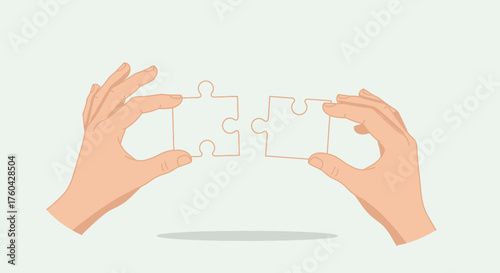 Two hands bringing together puzzle pieces symbolizing connection and collaboration showing