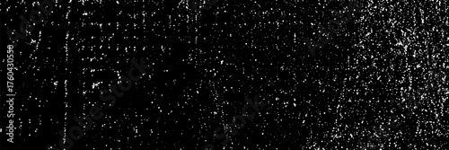 Simple background with white spray drop and splatters on a black backdrop. Overlay texture. Punk rock style. Street graffiti culture. Vector asset.