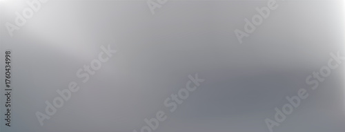 Silver background with gradient grey mirror metal foil. White sheen and smooth surface reflect light. Abstract chrome texture with aluminum gloss, titanium plate effect, and ambient cold reflection