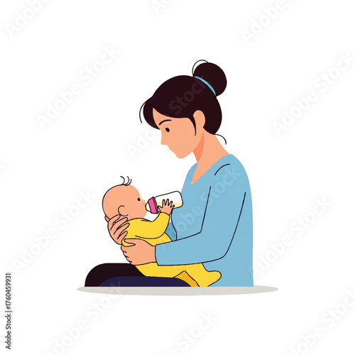 Caring young mother holding her newborn infant in her arms and bottle-feeding the baby with milk