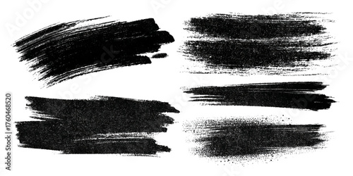 Hand drawn black grunge brush strokes and textured ink marks .Abstract artistic paint smear collection for backgrounds .grunge brush texture set rough, textured and artistic stroke design .