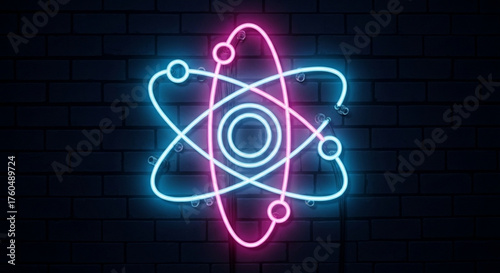 A neon atom with pink and blue glows against a dark brick wall, representing science, energy, and the building blocks of matter