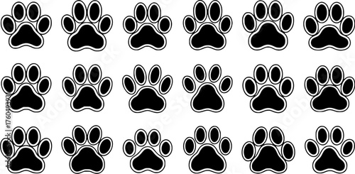Seamless pattern of black and white paw prints, animal track background for textile and design