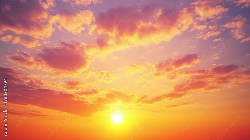 Obraz premium Vibrant sunset with layers of painted clouds at dusk