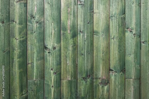 green wooden planks with close up texture and patterns. natural wooden background. empty wooden template. minimalist natural mock up with