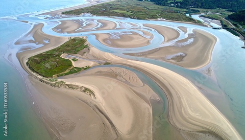Aerial View of Tidal Flats with Meandering River and Sand Textures