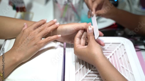 Professional Nail Care and Manicure Process with Focus on Hands and Tools in Beauty Salon Setting for Personal Grooming and Self-Care