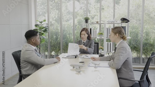 Business meeting in conference room. Airline professionals.