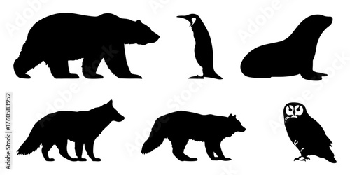 Set of six black animal silhouettes including a polar bear penguin walrus seal fox and owl on a silhouette