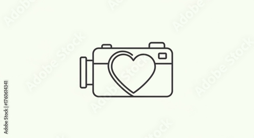 A charming camera with a heart, , representing the passion for capturing love stories and creating unforgettable memories through film