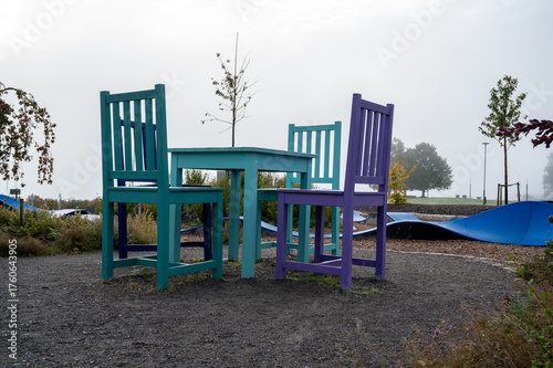 Big size chairs and table at childrens playground