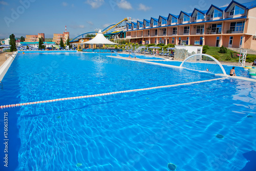 Gelendzhik resort. Zolotaya Bukhta water park. A large swimming pool with a white tent in the background