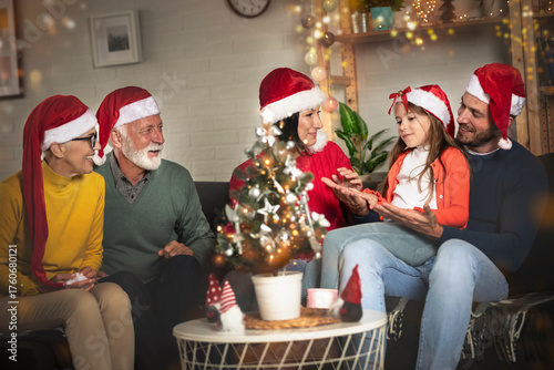 Family in the living room for Christmas