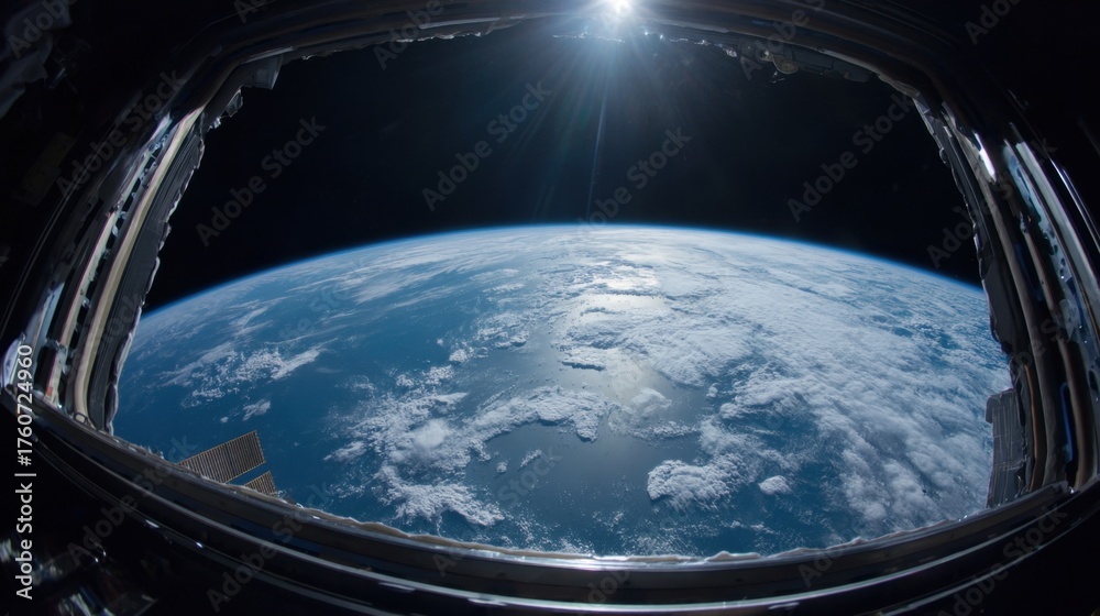 Fototapeta premium Bright sunlight illuminates Earth showcasing vibrant oceans and soft white clouds from space.