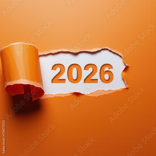 Bright future ahead as the year 2026 emerges from torn orange paper revealing new possibilities