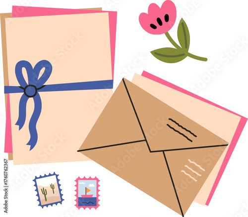 Letters envelopes postage stamps and a delicate flower