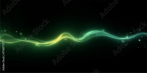 Abstract glowing green and yellow energy wave with small particles on a dark background
