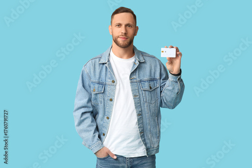 Stylish man in jeans and de...
