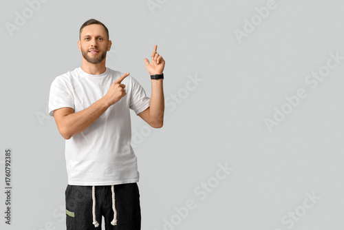 Stylish young man in black ...