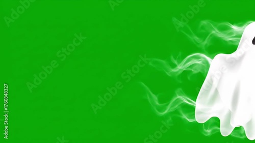 Flying white ghost on a green screen chromakey background for spooky Halloween visual effects for compositing	