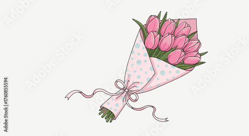 A beautiful bouquet of pink tulips tied with a ribbon.