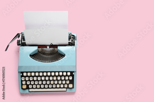 Vintage typewriter on pink ...