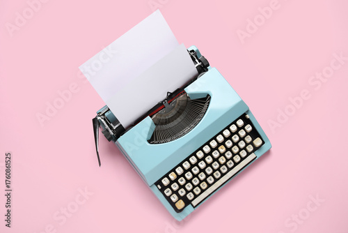 Vintage typewriter on pink ...