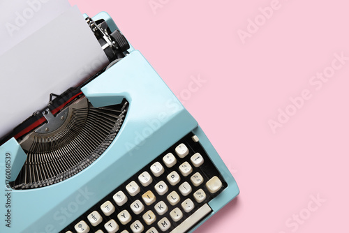 Vintage typewriter on pink ...
