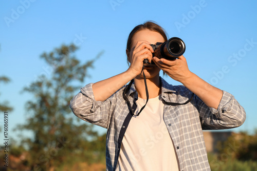 Beautiful photographer with...