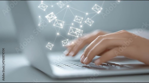 A person is typing on a laptop with a lot of emails on the screen. Concept of a busy workday, with the person likely working on multiple tasks and communicating with others through email