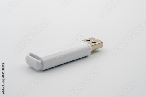 USB flash drive, USB Type-A connector, designed for portability. Commonly used for personal data transport and backup. Data exchange, compatible with multiple operating systems, plug-and-play device.